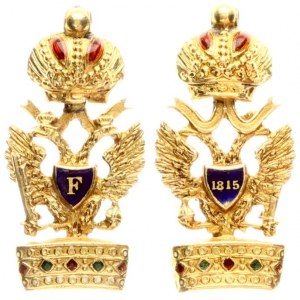 A Miniature Austrian Imperial Order Of The Iron Crown In Gold. Miniature in Gold and enamels. Pendant of a golden double-headed eagle F 1815. Gold (18 Karat). Weight approx: 1.31g. Diameter: 19x9mm