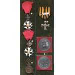 Display case of medals and badges after the Lebkowski family, including Lancer Mieczyslaw Lebkowski