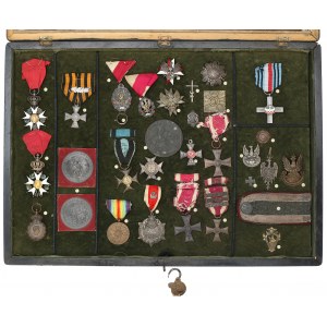 Display case of medals and badges after the Lebkowski family, including Lancer Mieczyslaw Lebkowski