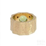 A green peridot set ring of abstract design, by MJM Atelier, 21st century