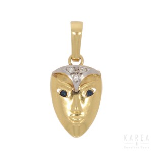 A pendant modelled as a mask, 20th century