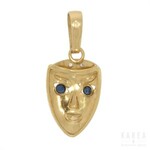 A pendant modelled as a mask, 20th century