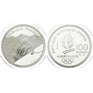 France 100 Francs 1989 1992 Olympics. Averse: Alpine skiing. Reverse: Cross on flame; date and denomination; logo below...