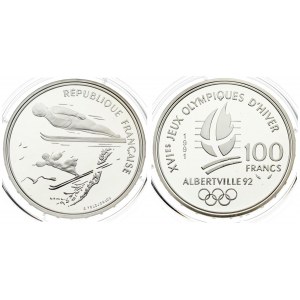 France 100 Francs 1991 1992 Olympics. Averse: Ski jumpers. Reverse: Cross on flame; date and denomination; logo below...