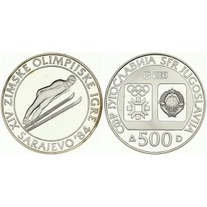 Yugoslavia 500 Dinara 1983 Ski Jumping. Averse: Emblem and Olympic logo on separate shields within flat bottom circle...