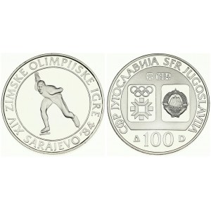 Yugoslavia 100 Dinara 1984 Speed Skating. Averse: Emblem and Olympic logo on separate shields within flat bottom circle...