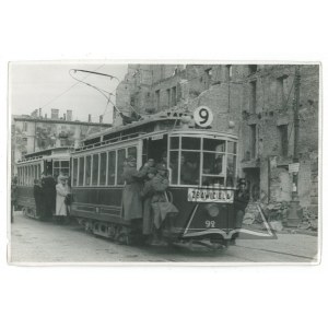 (WARSAW after World War II). Streetcar 9 on the street of the destroyed city.