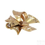 A brooch modelled as a stylised bow, France, 1960s-70s
