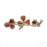 A shamrock motif coral brooch, early 20th century