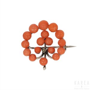 A circular openwork coral bead brooch, late 19th/early 20th century