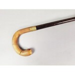 Walking stick with curved handle