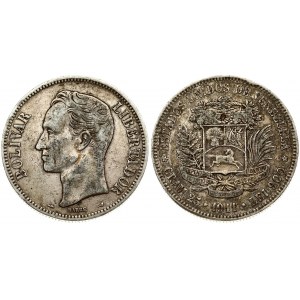 Venezuela 5 Bolivares 1911 Averse: Date on ribbon right of arms 13 DE APRIL DE 1864; cornucopias above. Averse Legend...