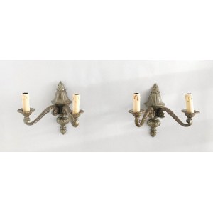 A pair of wall sconces with an amphora decoration