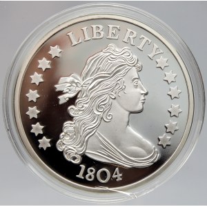 USA. REPLIKA 1 dollar 1804 z řady „Nejznámější repliky mincí“. Cu postř. 40 mm, plexi pouzdro, číslovaný (č. 07124...