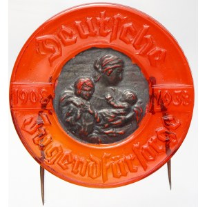Německo - III. říše . Odznak německých matek 1908 - 1938. Červené sklo 38 mm s bronz. středem...