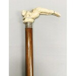 Walking stick with a handle in the form of a lying pierrot