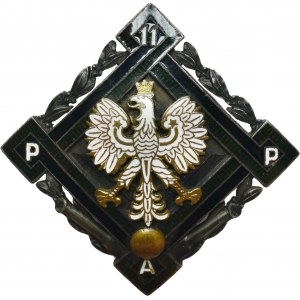 Commemorative badge of the 11th Carpathian Field Artillery Regiment from Stanisławów