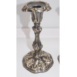 a pair of candlesticks in the neo-Rococo style
