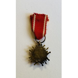 Miniatura medalu Za Obronę Mienia Polskiego w Rosji