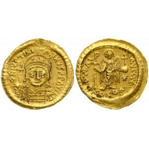 Byzantine Empire 1 Solidus (527-565) Justinian I (527-565). Obverse: Helmeted and cuirassed bust facing...