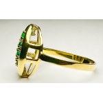 Gold ring with emeralds