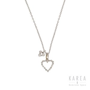 Pendant in the form of a heart and clover with a chain, contemporary