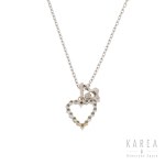 Pendant in the form of a heart and clover with a chain, contemporary