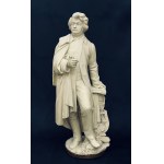Figura stojącego Adama Mickiewicza na cokole