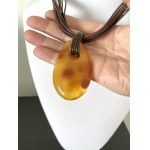 Staggering Amber Pendant with chain, shaped like a Drop