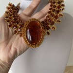 Unique and Staggering Amber Floral Necklace made from leaf like bead ornaments