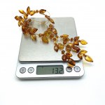 Unique and Exquisite Amber Floral Necklace made from leaf like bead ornaments