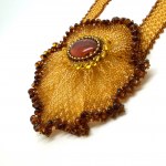 Unique and Alluring Amber Floral Necklace made from leaf like bead ornaments