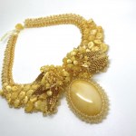 Phenomenal Vintage Amber Floral Necklace made from leaf like bead ornaments