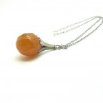 Antique Amber Pendant with chain, shaped like a Ball