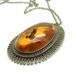Unique and Stunning Amber Pendant with chain, shaped like a Star