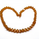 Magnificent Vintage Amber Necklace made from Hand Carved Amber beads