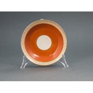 Spodek porcelanowy (A Wedgewood orange ground and gilt circular saucer)