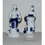 Porzellanfiguren von einer Frau und einem Mann.