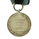 Srebrny Medal Zasłużony na Polu Chwały. Wyk. Caritas