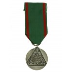 Medal Za Ofiarność i Odwagę z leg. z 1976 r. i miniaturką