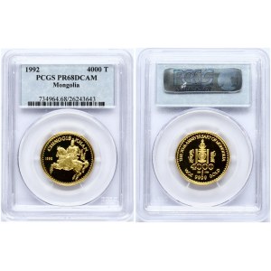 Mongolia 4000 Tugrik 1992 Obverse: Soembo arms above value. Reverse: Horse and rider left. Gold (0.9999) 15.59g. KM 81...