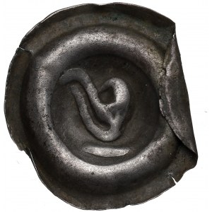 Śląsk, brakteat zredukowany XIII/XIVw., głowa orła w lewo
