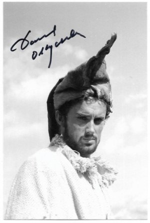 [OLBRYCHSKI Daniel]. Signature of the actor on a black and white photograph depicting him in the film 