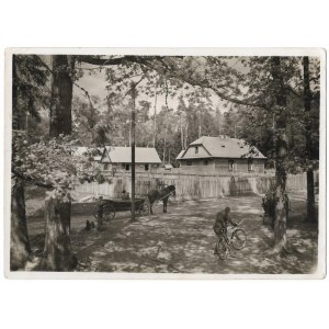 [Bialowieza Forest - in front of farm buildings - situational photograph]. [late 1920s]....