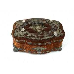 [jewelry box]. A casket from the turn of the 20th century, trimmed with velvet,...