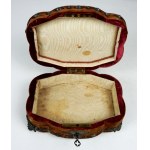 [jewelry box]. A casket from the turn of the 20th century, trimmed with velvet,...