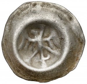 Brakteat - Aquila dritta, rivolta a sinistra, con la punta all'altezza del collo.