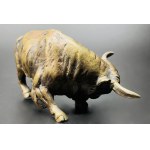A full-figure figure of an exasperated bull
