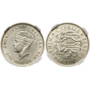 Cyprus 9 Piastres 1938 George VI (1936-1952). Obverse: Crowned head left. Reverse: Two stylized rampant lions left...