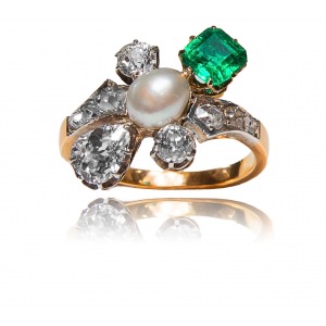 Old ring author's work with emerald and diamonds